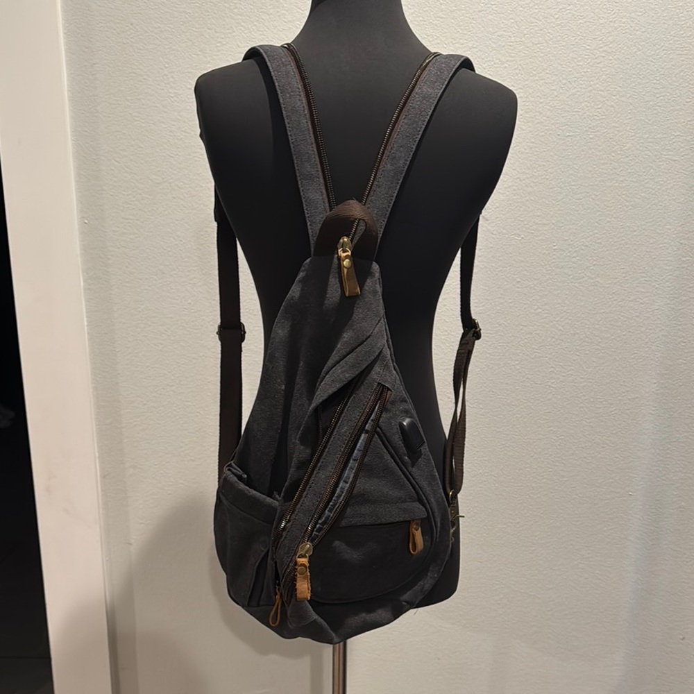Black and Brown Denim Backpack with Leather Accents